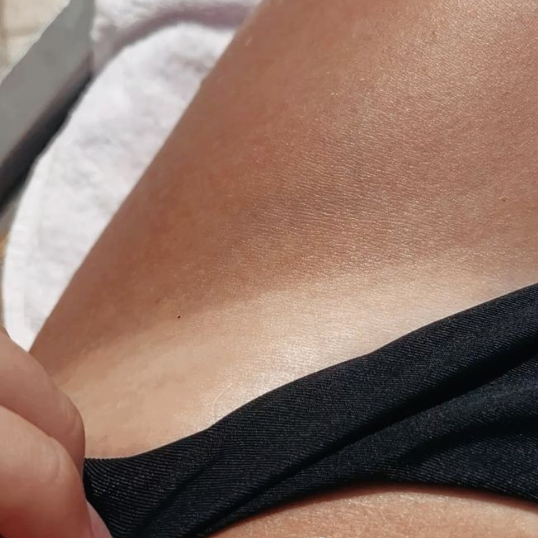 Aceite bronceador iluminador
